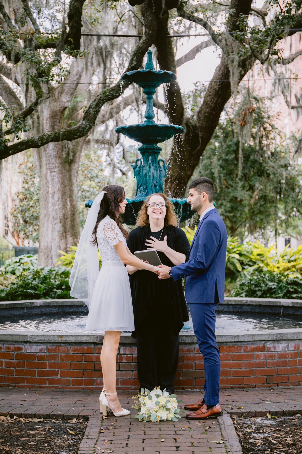 A ceremony beside the fountain in Lafayette Square, Savannah. Josh Stewart Photography.
