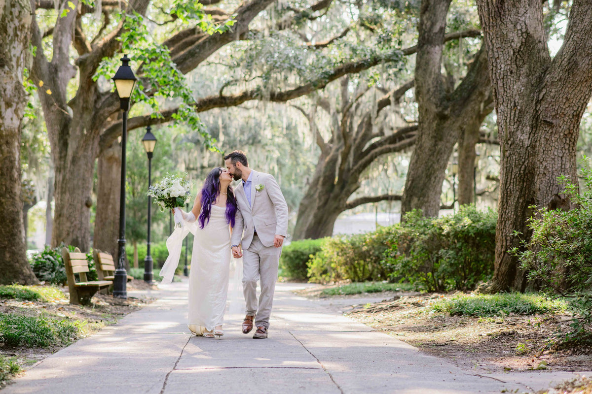 A couple beneath live oaks in Savannah. Josh Stewart Photography.